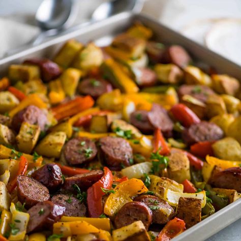 Sausage and Potatoes (Bake in Oven) Dutch Oven Sausage And Potatoes, Baked Sausages In Oven, Kielbasa And Potatoes Bake, Sausage And Potatoes In Oven, Oven Baked Sausage, Sausage Sheet Pan Meal, Sausage Potatoes And Peppers, Bake Sausage In Oven, Sausage Sheet Pan