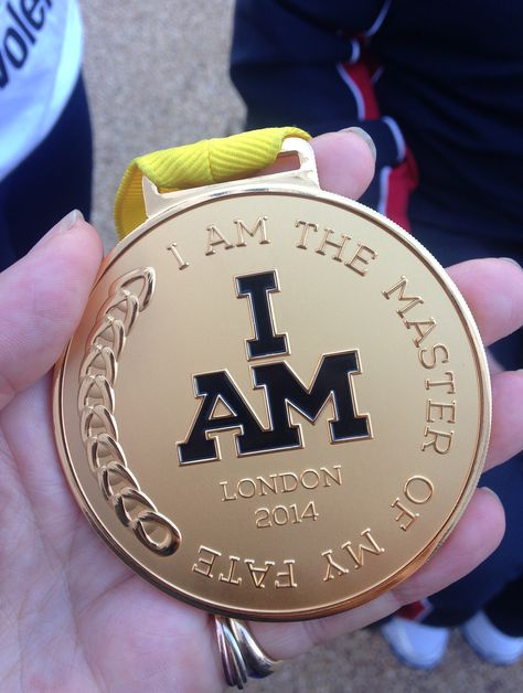 An 'I Am' Invictus Games medal. Invictus Games, Michael Kors Watch, Michael Kors