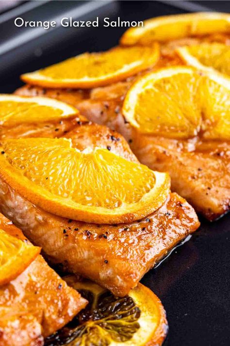 This Orange Glazed Salmon recipe is a simple yet elegant dish, featuring succulent salmon fillets coated in a sweet and salty orange soy glaze. Cranberry Orange Salmon, Salmon With Orange, Roasted Salmon Recipes, Orange Glazed Salmon, Soy Glaze, Salmon Glaze Recipes, Orange Syrup, Orange Salmon, Baked Salmon Recipes