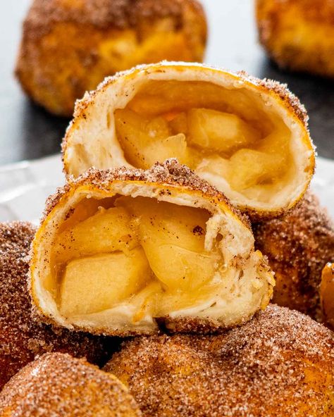 These delicious Air Fryer Apple Pie Bombs are incredibly simple to make using refrigerated biscuits filled with apple pie filling, cooked in the air fryer then coated in butter and cinnamon sugar. #airfryer #applepiebombs #recipes Air Fryer Apple Pie, Stuffed Biscuits, Apple Pie Filling, Apple Pies Filling, Cinnamon Sugar, Pie Filling, Apple Pie, Air Fryer, Biscuits