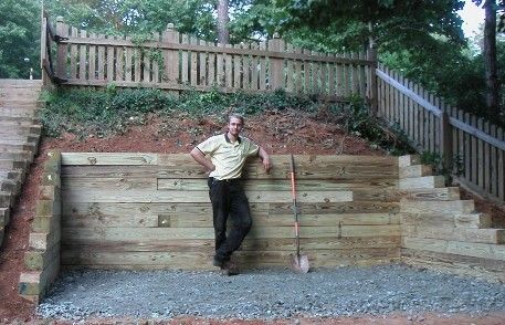 landscaping idea - wood retaining wall Retaining Wall Steps, Wood Retaining Wall, Backyard Retaining Walls, Sloped Backyard Landscaping, Landscape Stairs, Landscape Timbers, Landscape Steps, Sloped Backyard, Landscaping Retaining Walls