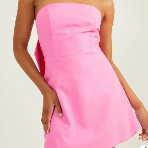 Nwt Lilia Strapless Bow Dress. Pink. Classic Strapless Cut With A Bow Back Detail To Steal The Show. Per Website, This Style Runs Small, Size Up If In Between Sizes. Fitted Mini, Zipper Closure, 40% Linen, 40% Viscose, 10% Polyester, 10% Cotton. Size S Is 25�” Length From Neckline To Hem. Bright Pink Homecoming Dress, White Ruffled Mini Dress, Spring Formal Mini Dress With Bow Straps, Formal Strapless Mini Dress With Bow, Chic Pink Mini Dress With Bow Straps, Pink Mini Dress With Bow Straps, Pink Strapless Mini Dress With Ruffles, Hoco Dresses Pink, Red Beaded Dress