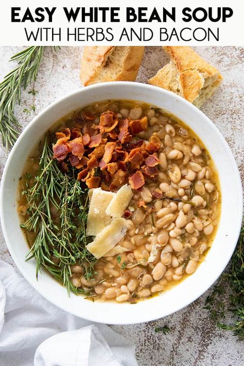 This White Bean, Bacon, and Garlic soup is a super creamy one pot wonder dinner!  A healthy, hearty, soul warming soup that comes together in a snap and is packed full of flavor! Brothy Beans, The Salty Marshmallow, Salty Marshmallow, Homemade Vegetable Broth, Potato Soup Crock Pot, Leftovers Soup, Garlic Soup, White Bean Soup, Vegetarian Soup