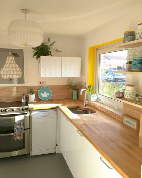 26 Yellow Kitchen Design Inspirations to Brighten Any Cook Space | Hunker Yellow Kitchen Designs, Kitchen Color Yellow, Yellow Kitchen Cabinets, Yellow Window, Orange Kitchen, Yellow Kitchen, White Countertops, Updated Kitchen, Kitchen Colors