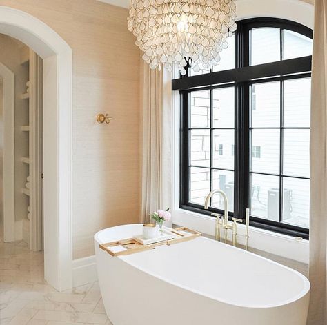 Who wouldn’t want a soak in that beautiful tub! Remember to visit the parade of homes this week starting Tuesday if you haven’t been yet.… Capiz Chandelier, Bathroom Chandelier, Gorgeous Bathroom, Parade Of Homes, Remodel Bedroom, House Interior Decor, Holiday Cottage, Beautiful Bathrooms, Master Bath