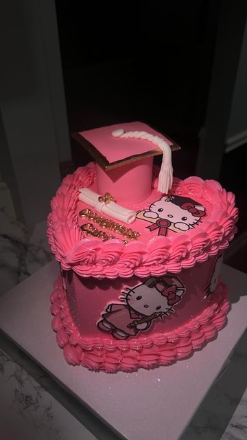 Pamela Anaele on Instagram: "Congrats Carina! Hello Kitty Graduation heart cake🤩. I love everything about this cake. From the heart shape to the color pink, the gold sugar pearls, the hello kitty’s around and on top the cake and of course the glitter. #baltimorebaker #baltimorecakes #pinkcake #glittercake #heartcake #vintagecake #cakereels #caketrends #trendingreels #dmvbaker #dmvcakes #instacake #customcakes #cakesofinstagram #birthdaycake #cutecake #blowthisup #graduationcake #graduationcap #hellokitty #hellokittycake" Hello Kitty Graduation, Heart Cake Decoration, Hello Kitty Birthday Cake, Nursing Graduation Pictures, Crown Cake, Heart Shaped Cakes, Hello Kitty Cake, Cake Trends, Hello Kitty Birthday