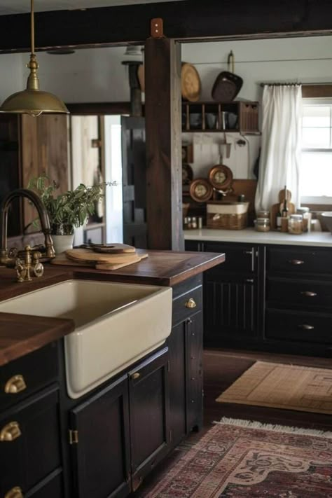 rustic black moody farmhouse kitchen Cozy Kitchen Black Cabinets, Moody English Kitchen, Moody Vintage Farmhouse, Moody Kitchen With Oak Cabinets, Antique Modern Farmhouse, Rustic Kitchen With Black Countertops, Moody Kitchen White Cabinets, Rustic Black And White Kitchen, Old Farmhouse Remodel Interior