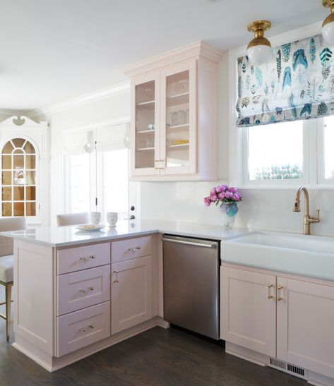 White Farm Sink, Pink Kitchen Cabinets, Dark Wooden Floor, Pink Cabinets, Kitchen Peninsula, Beautiful Kitchen Cabinets, Leather Counter Stools, Farm Sink, White Marble Countertops