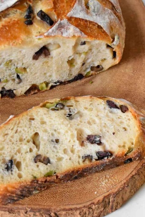 Sourdough bread made with olives and parmesan Olive And Feta Sourdough, Chive Sourdough Bread, Olive Sourdough Bread Recipe, Green Olive Sourdough Bread, Olive And Cheese Bread, Sourdough Bread With Cheese, Mediterranean Sourdough Bread, Italian Herb And Cheese Sourdough Bread, Sourdough Sub Bread