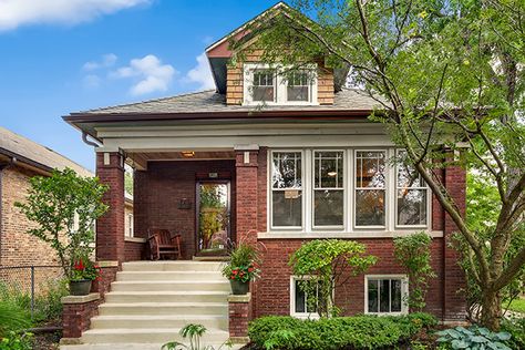 Cute Albany Park bungalow lists for $350K - Curbed Chicagoclockmenumore-arrownoyes : This well-preserved 1920 home is a handsome example of the classic Chicago bungalow style Chicago House Exterior, Chicago Bungalow Remodel, Bungalow Homes Exterior, Bungalow Front Porch Ideas, Brick Bungalow Exterior, Dream Landscaping, American Craftsman House, Clybourne Park, Bungalow Landscaping