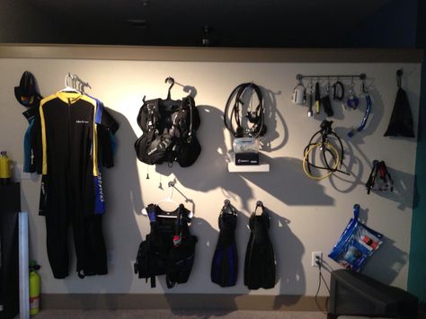 Scuba diving gear storage. On the wall of my living room. Soooo not getting my deposit back on this apartment. Gear Room, Diving Wetsuits, Gopro Surfing, Gear Storage, Dive Computers, Scuba Diving Equipment, Scuba Diving Gear, Best Scuba Diving, Scuba Gear