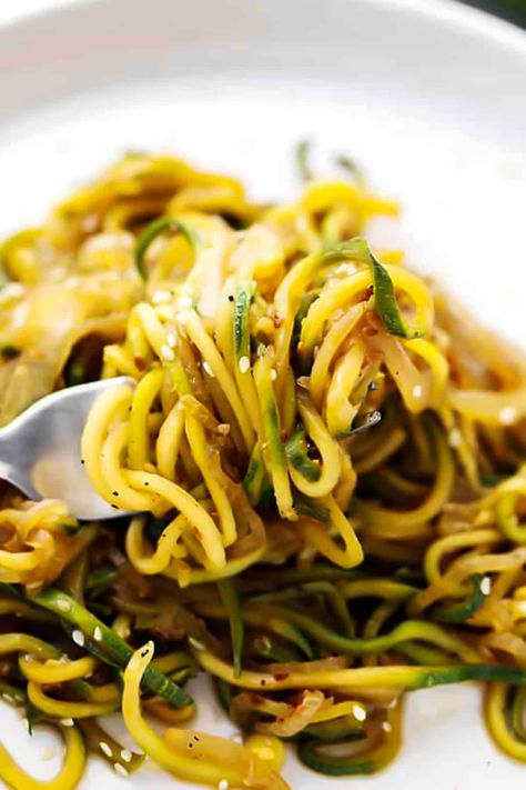 Zucchini Noodles are prepared in a delicious, healthy stir fry with spiralized zucchini and onions tossed with teriyaki sauce and toasted sesame seeds. Stir Fry Zucchini, Stir Fry Zucchini Noodles, Zucchini And Onions, Pan Fried Zucchini, Veggie Noodles Recipes, Stir Fry Sauce Recipe, Zucchini Noodle, Zucchini Noodle Recipes, Noodles Recipes