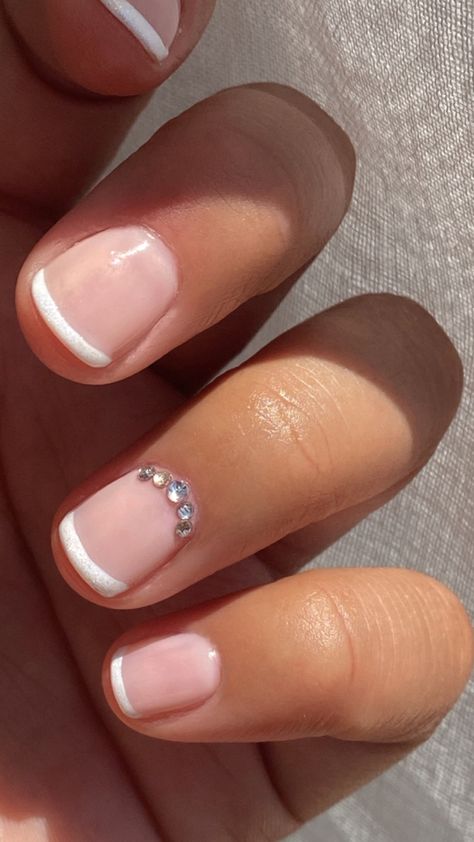 Trending French Tip Nails Short, Short French Manicure With Rhinestones, French On Natural Short Nails, White French Nails Ideas Short, Short Natural Nails No Acrylic, Gel Natural Nails Ideas Short, Very Short Natural Nails Ideas, Short French Tip Acrylic Nails With Accent Nail, Very Short Squoval Nails