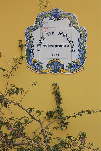 pretty Azulejo tiles are used as the nameboards of most houses in Panaji...the white-and-blue tiles set against the dark blue, red and yellow walls look just stunning! Goan Houses, Azulejos Tiles, Yellow Walls, Blue Tiles, Red And Yellow, Goa, Potpourri, Art Store, Hippie Boho