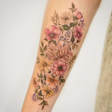 LOST SANCTUM TATTOO GC on Instagram: "Gorgeous wildflower tattoo by @asongtattoo 💐 #wildflowertattoo #cottagecore #floraltattoo #flowertattoo #botanicaltattoo #watercolourtattoo" Watercolour Wildflower Tattoo, Realistic Wildflower Tattoo, Colorado Wildflowers Tattoo, Wildflower Tattoo Sleeve, Quantum Tattoo, Wildflower Tattoo Ideas, Wildflower Tattoo Design, Wildflower Tattoos, Paintbrush Tattoo