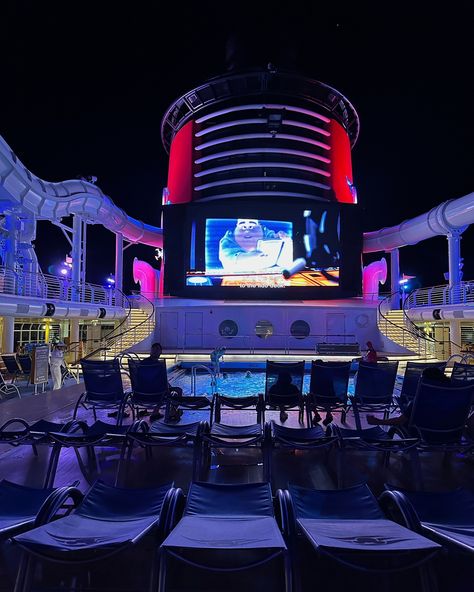 🎥🚗 National Drive-In Movie Day is the perfect day to celebrate what we call DIVE-IN movies on Disney Cruise Line! Whether lounging on a deck chair or floating in the pool, a massive screen shows your favorite Disney flicks day and night. 🌞🌜It’s just like a drive-in, with lounge chairs and ocean views instead of cars and parking lots. Day or night, there’s something utterly magical ✨about watching a movie on the jumbo screen, sea breeze in your hair, without a care in the world.🌍 Who else thi... Deck Aesthetic, Dive In Movie, Pool Movie, Movie Day, Watching A Movie, Drive In Movie, Cruise Line, The Perfect Day, Deck Chairs