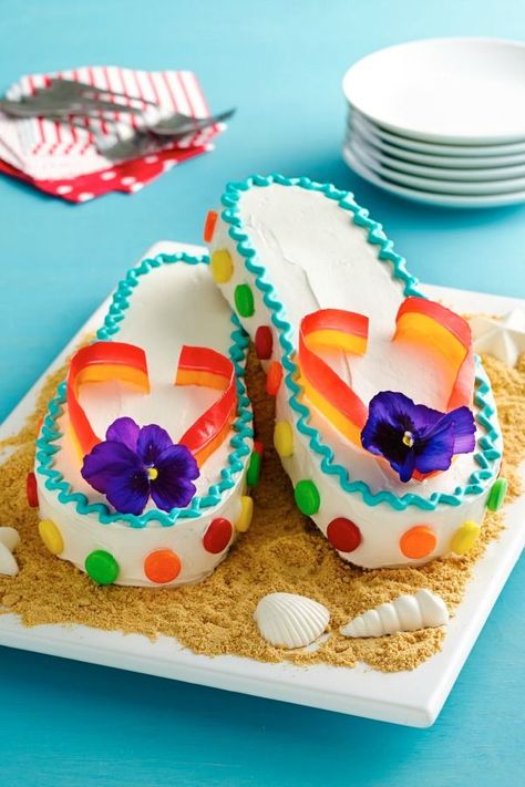 Hit the beach without encountering a grain of sand! These cute and colorful sandal cakes will be the talk of the table, and they’re easy to make with the downloadable template and how-to video. Pro tip: If you can’t find edible flowers, just use silk ones! http://www.bettycrocker.com/recipes/flip-flops-cake/c7a5c9c1-1978-4871-b275-38a1240358db?nicam4=SocialMedia&nichn4=Pinterest&niseg4=BettyCrocker&nicreatID4=Post&crlt.pid=camp.7AZ1QvgpTHMS&utm_content=buffer1cd9f&utm_medium=social&utm_source=p… Flip Flop Cakes, Betty Crocker Cake, Hello Sweetie, Frozen Cake, Fancy Cakes, Creative Cakes, Cute Cakes, Cakes And More, Let Them Eat Cake