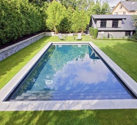 I like this idea of a wider pool coping surrounded by turf and then a seat wall framing it, at one side. There's a drama to a pool surface that isn't divided by the spa. Country Pool, Swimming Pool Pictures, Simple Pool, Pool Design Ideas, Swimming Pool Decks, Pools Backyard Inground, Custom Swimming Pool, Pool Landscape Design, Pool Picture