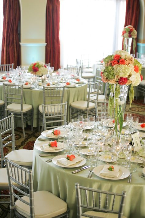 Orange | Green | White | Wedding Reception | Flowers by Cina    Beautiful. Sage tablecloths with white napkins from LinenTablecloth mixed with orange flowers makes that pop just right. Green And Orange Wedding Table, Sage Green And Pastel Orange Wedding, Sage Green And Light Orange Wedding, Mint Green And Orange Wedding, Orange And Green Event Decor, Napkins Wedding Table, Green Wedding Decorations, White Weddings Reception, Wedding Entrance Decor