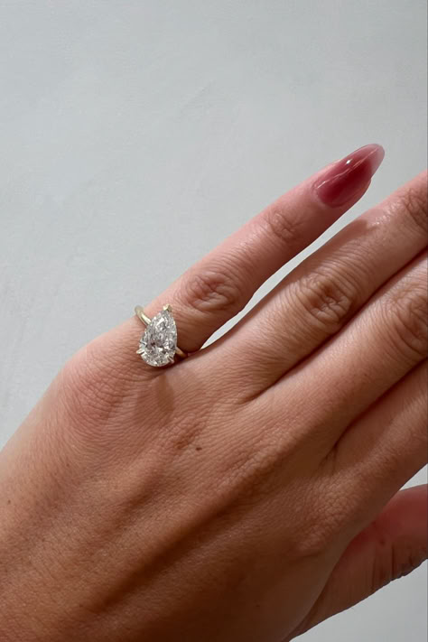 Pear diamond pinky ring | Pear diamond engagement ring | Hailey Bieber engagement ring inspo | Emrata pear diamond ring | Pinky ring | Pear diamond | Engagement ring Hailey Bieber Pinky Ring, Emrata Ring, Hailey Bieber Engagement, Hailey Bieber Engagement Ring, Diamond Pinky Ring, Pear Diamond Ring, Pear Diamond Engagement Ring, Pear Diamond Rings, Ring Inspo