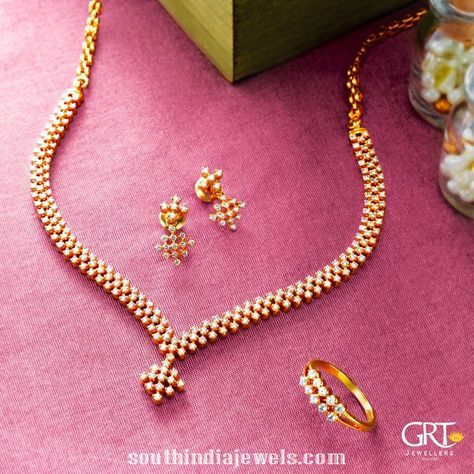 Simple diamond necklace set from GRT Jewellers. The necklace set consists of pair of earrings and rings. For inquiries please contact +914423461551. Simple Diamond Necklace, Grt Jewellers, Diamond Necklace Simple, Gold Jewelry Simple Necklace, Diamond Necklace Designs, Gold Necklace Indian Bridal Jewelry, Diamond Necklace Set, Simple Diamonds, Diamond Jewelry Necklace