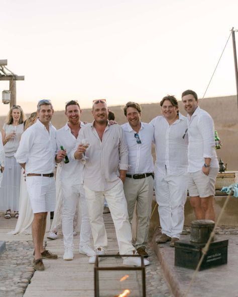 An unforgettable welcome party we created in the middle of a desert with an all white dress code, celebrating the arrival of guests to Morocco for a multi day wedding following a more intimate roof top gathering in the medina. With poolside drinks as the sun set, and a spectacular dining experience under the stars surrounding my thousands of candles, before a live fire show and music to dance around the fire pits. 📷 @katiejulia_ #destinationwedding #partyplanner #weddingplanner #weddingin... All White Wedding Guests Outfits, White Dress Code Party, All White Party Attire, All White Dress Code, Multi Day Wedding, White Welcome Party, Sifnos Wedding, Welcome Party Outfit, White Out Party