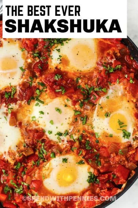 Bright & savory, this colorful Shakshuka dish is absolutely bursting with flavor! It can be made mild or spicy, either way this delicious and different breakfast dish is sure to please. #spendwithpennies #shakshuka #recipe #breakfast #easy #Israeli #eggs #best #withfeta #fresh Eggs Shakshuka Breakfast, Shakshuka Eggs, Pepper Tomato Sauce, Easy Breakfast Dishes, Butter Spreads, East Recipes, College Recipes, Shakshuka Recipe, Breaking Fast