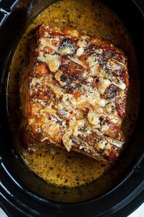 Creamy Garlic Pork Loin in Crockpot — Easy, comforting and tender pork loin in crockpot with the creamiest garlic sauce ever. Pork Loin In Crockpot, Garlic Pork Loin, Tender Pork Loin, Roast Mississippi, Pork Loin Crock Pot Recipes, Crockpot Pork Loin, Garlic Pork, Crockpot Meal, Mississippi Roast