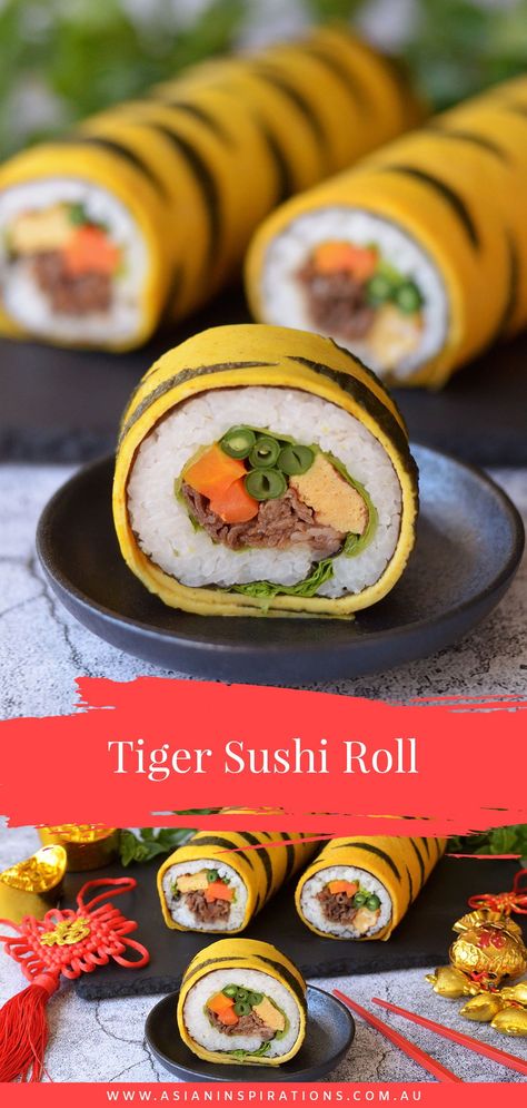 Try our Tiger Sushi Roll in celebration of the 2022 Chinese Year of the Tiger. Recipe by Asian Inspirations. #tigersushiroll #sushiroll Hawaiian Sushi Roll, Tiger Food Ideas, Peanut Butter Banana Sushi Roll, Cooked Sushi Rolls, Tiger Sushi Roll, Caterpillar Roll Sushi, Lsu Roll Sushi, Tiger Roll Sushi, Dragon Roll Sushi