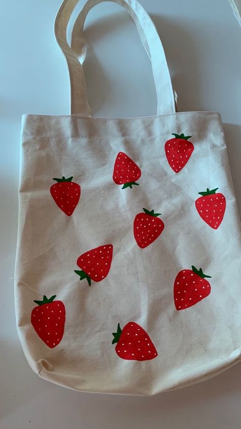 Bags, clouth, strawberries 🌈☀️ ~ Follow me for more bags ideas 🫶🏻 Canvas Tote Bag Painting Ideas, Painting A Tote Bag, Cute Painted Tote Bags, Tote Bag Designs Paint, Painted Tote Bags Ideas, Tote Bags Painting Ideas, Tote Bag Design Paint, Tote Bag Ideas Paint, Tote Painting Ideas