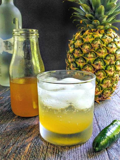 This pineapple jalapeño shrub cocktail has the sweetness of pineapple, the tang of vinegar and the heat of jalapeños. Great with seltzer or vodka for a refreshing summer drink. Mock Cocktails, Shrub Drink, Shrub Recipe, Best Herbal Tea, Medicinal Tea, Vinegar And Honey, Refreshing Summer Drinks, Healthy Food Blogs, Summer Drink