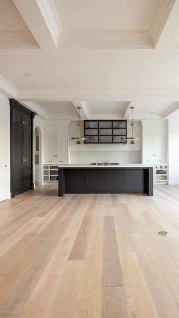 Kate Rumson on Instagram: "After dreaming about and working on this kitchen for years, I still can’t believe it’s finally finished. I love every inch of this space but those polished steel drawers left me speechless yesterday when I saw them uncovered for the first time. Custom cabinetry & hardware: @christopherpeacock Appliances: @monogramappliances Faucet: Litze by @brizofaucet Countertop: Cloudburst Concrete by @caesarstoneus Sink: DXV from @buildwithferguson Lighting: Collier by @hinkl Kate Rumson, Cloudburst Concrete, Picture Molding, Cabinetry Hardware, Modern Craftsman, Chair Rail, Kitchen Floor, Custom Cabinetry, Kitchen Style