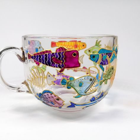 Bright and colourful cup with fish design. Wonderful present for fishing lovers.   It's perfect for hot and cold drinks, ex. tea or cacao drink! This is the perfect gift for family, friends or yourself. Coffee mug/ tea cup is hand painted and can be personalised. If you want to add your name or text - write it while placing your order. Measurements: Height 8 cm / 3 inch About 500 ml / 17 oz I use non-toxic glass paints on water basis. I baked this mug in the oven to make it more durable. You can Boyfriend Gifts Fishing, Funky Glass Cups, Small Useful Gifts, Gifts For Bath Lovers, Small Gifts For Friends Birthday, Decor For Men, Artsy Christmas Gifts, Silly Gifts For Friends, Gifts For Artsy Friends