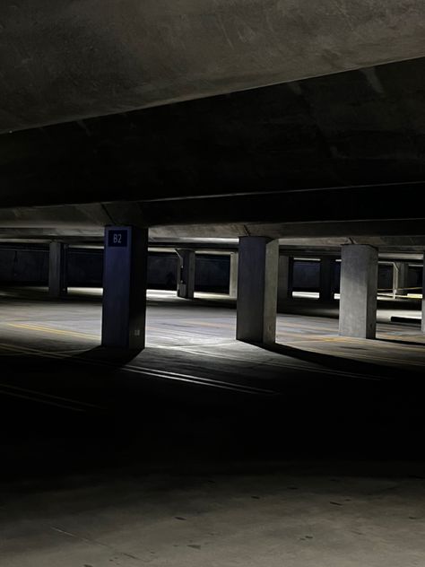 dark parking garage grudge emo aesthetic empty public place insomnia Parking Garage Background, Basement Parking Aesthetic, Dark Parking Lot Aesthetic, Liminal Space Parking Lot, Abandoned Parking Garage, Liminal Space Photoshoot, Parking Garage Photography, Empty Parking Lot Night Aesthetic, Liminal Space Photography