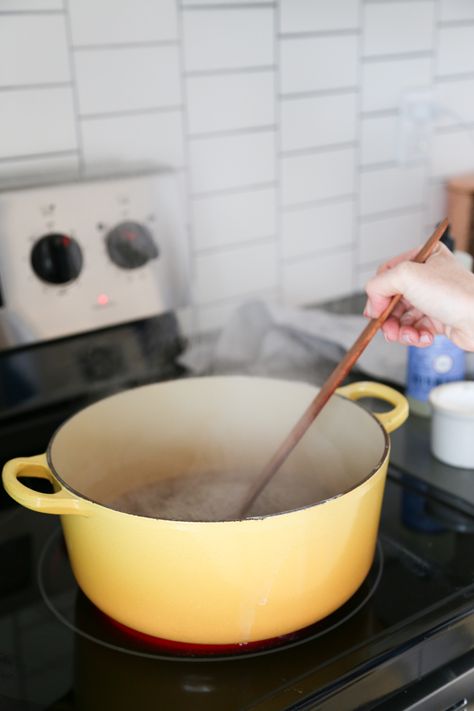 Learn how to clean an enameled cast iron dutch oven with baking soda. It will get rid of any stains and stuck on food without ruining your enameled pot. | platingsandpairings.com How To Clean Porcelain Cast Iron Pot, Cleaning Enameled Cast Iron, Baking Powder For Cleaning, Iron Cleaning, Oven Cleaning Hacks, Cleaning Diy, Enamel Dutch Oven, Cast Iron Cleaning, Baking Powder Uses