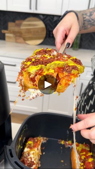 A new way to do hotdogs! | A new way to do hotdogs!

Jen makes a loaded pizza dog in the air fryer | By Justine’s Kitchen | Alright, that was four hotdog
buns in our air fryer. I'm going right in with our ragu
and a small little ice cream scoop for this super fun and
easy little air fryer recipe. It's a little gloomy out today.
So, instead of barbecuing, we are going straight for the air
fryer for this perfect little barbecue recipe. Just going in
with maybe one to two scoops of my favorite pizza sauce right
into those hot dog buns just like so. I Perfect. You could
do a pesto and a or an Alfredo here but I love just using the
original marinara. I'm going in next. I have just some
beautiful little sausage Franks. I'm just going to pop
those right into our buns and I just kind of went with Veggie Dog, Pizza Dog, Barbecue Recipe, Air Fryer Recipe, Hot Dog Recipes, Barbecue Recipes, Pizza Sauce, Marinara, Ice Cream Scoop