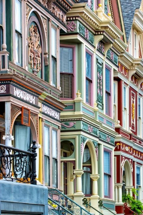 Colorful homes in this San Francisco community look like they're straight out of a children's coloring book. Painted Ladies San Francisco, Residence Architecture, San Myshuno, Victorian Style Homes, Painted Ladies, Colourful Buildings, San Francesco, Victorian Architecture, San Fran