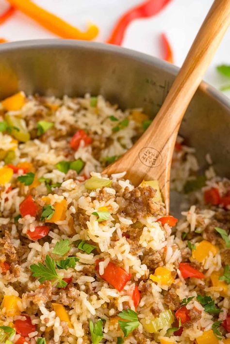 Colorful and tasty, easy one pan sausage and rice makes a simple weeknight dinner that is satisfying and quick. Our family loves it and I'm sure yours will, too! Sweet Peppers Recipe, One Pan Sausage, Pan Sausage, Sausage And Rice, Sweet Pepper Recipes, Ground Italian Sausage, One Pot Pasta Recipes, Sweet Peppers, Dinner Inspiration