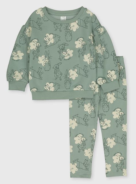 Know a little one who's hopping mad about Peter Rabbit? They'll love this cosy sweatshirt and joggers combo. Decorated with prints of Peter running, jumping and generally larking about, the top has a brushed inner for a cosy feeling and the joggers have an elasticated waist for a comfy fit. Peter Rabbit  1 x Green printed sweatshirt  1 x Green printed joggers Crew neck Brushed inner Elasticated waist Keep away from fire   Material Sweatshirt: 70% Cotton, 30% Polyester (Exclusive O Cotton Jersey Dress, Tu Clothing, Girls Joggers, Sweat Set, Printed Joggers, Unisex Baby Clothes, Peter Rabbit, Girls Pajamas, Kids Fashion Girl