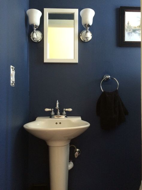 Wall paint is Indigo batik from Sherwin Williams. Small powder room or 1/2 bathroom with a color that adds subtle style. Bathroom Ideas Simple, Indigo Bathroom, Blue And White Bathroom Ideas, Navy Blue And White Bathroom, Blue Bathrooms, Blue White Bathrooms, Basic Bathroom, Blue And White Bathroom, Unusual Bathrooms