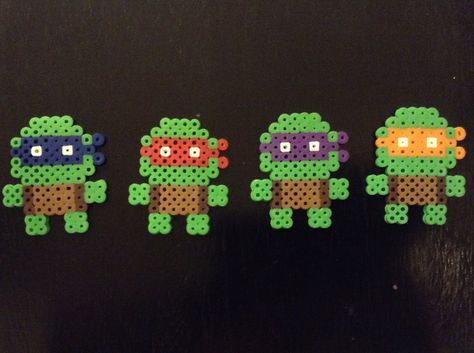 TMNT party favors More Perler Bead Ninja Turtle, Perler Beads Mini Pattern, Small Pearl Beads Ideas, Peeler Bead Ideas Mini, Mini Perler Bead Patterns Disney, Perler Beads No Black, Perler Beads Tmnt, Ninja Turtle Perler Beads, Mini Melty Beads Patterns