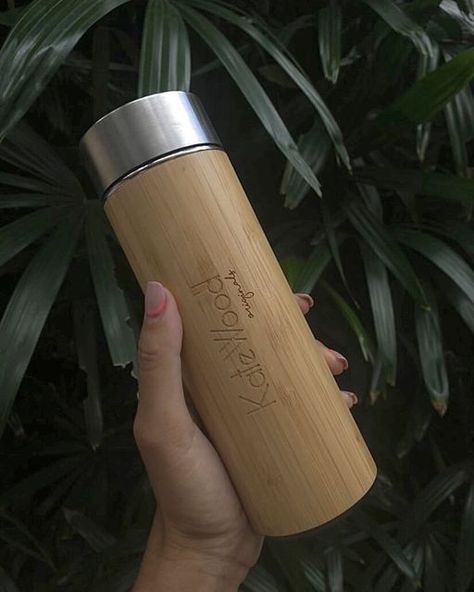 Kate Wood on Instagram: "Stylish water bottle is a plus point for your sustainable fashion. Like our Leak Proof Bamboo Vacum Bottle. Details: Volume: 450 ml Bamboo with Insulated Double Wall Vacuum Stainless Steel Thermos Bottle Temperature display on lid Including Tea Separation Strainer 📸 @sheashelewis #katewood #katewoodbali #sustainablefashion #sustainableliving #bali #balistore #woodensunglasses #woodenwatch #sundayoutfit #ootd #bamboobottle" Sustainable Water Bottles, Bamboo Bottle, Bamboo Water Bottle, Stylish Water Bottles, Steel Thermos, Stainless Steel Thermos, Wooden Sunglasses, Cleaning Wood, White Lotus