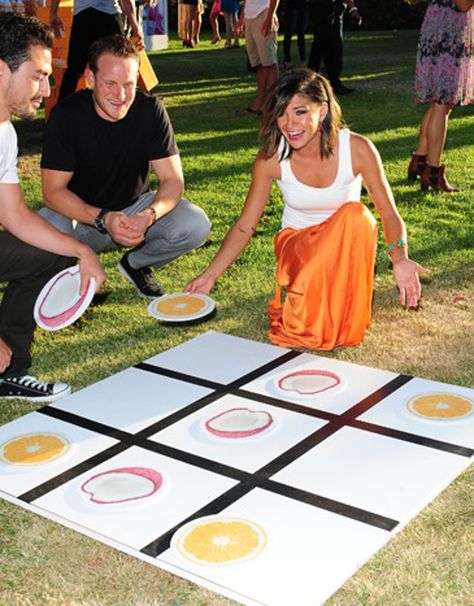 9 Modern Twists on Vintage Party Games | BizBash Life Size Jenga, Covered Pool, Event Marketing Plan, Old Fashioned Games, Citrus Slices, Activation Ideas, Vodka Brands, Brand Activations, Brand Activation