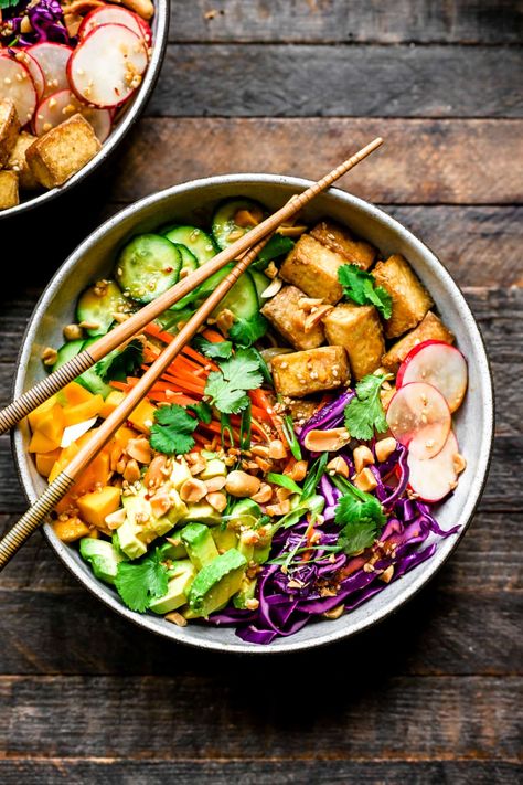 Looking for a quick, healthy and flavorful dinner recipe? Try these Spring Roll Bowls with Crispy Tofu, Avocado and a Sesame Miso Dressing! Vegan, gluten free and on the table in 30 minutes. #vegan #glutenfree #easydinner #weeknightdinner #tofu | crowdedkitchen.com Spring Roll In A Bowl, Tofu Avocado, Vegan Gluten Free Dinner, Vegan Spring Rolls, Crowded Kitchen, Spring Roll Bowls, Flavorful Dinner, Miso Dressing, Spring Roll