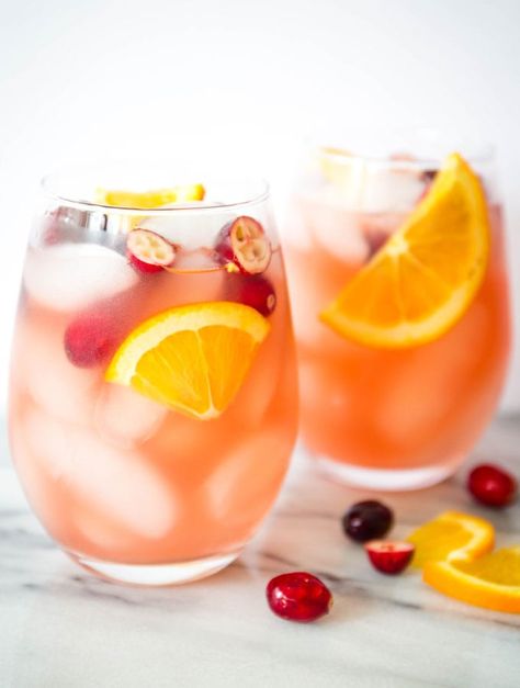 White Cranberry Sangria, Pineapple And Cranberry Juice, Cranberry Orange Sangria, Fruity Sangria, Pomegranate Mimosa, Orange Sangria, Cranberry Sangria, Sangria Ingredients, White Wine Sangria