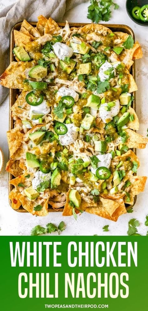 White Chicken Chili Nachos are loaded with cheese, chicken, white beans, and green chiles for a totally different spin on nachos that everyone devours! These sheet pan nachos are perfect for game day, parties, or even an easy weeknight dinner! Easy Chicken Nachos, Chili Slow Cooker, Chili Nachos, Chicken Nachos Recipe, White Chicken Chili Slow Cooker, Nachos Recipe Easy, Green Chili Chicken, Green Chiles, Chicken Nachos