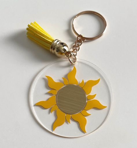 Summer sun keychain design ☀️ೃ࿔*:･ #sunkeychain #sundesign #cutekeychain #handmadekeychain #sunnycrafts #keychaindiy #suncharm #sunshinekeychain #uniquekeychains #sunlovers #handmadeaccessories #craftedwithlove❤️ #cuteaccessories #diykeychains #handmade #sun Sapahn Keychain, Resin Sunflower Keychain, Philippine Sun, Sun Keychain, Filipino Sun, Sunflower Keychain, Unique Keychains, Sun Designs, Keychain Design