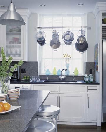 Pot Rack - This stainless-steel pot rack placed above the sink makes it simple to wash pots and hang them up to dry in the same spot. Kitchen Sink Window, Above Sink, Pan Storage, Pan Rack, Pot Rack Hanging, Kitchen Pot, Pot Rack, Hanging Pots, Hanging Racks