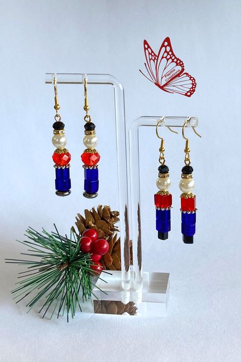 These fun Soldier Boy/ Nutcracker earrings will get you into the spirit of Christmas This entertaining pair of festive earrings will get you noticed making you feel all the fun and glamour of Christmas. Fun, cute and definitely chic. Nutcracker Jewelry, Nutcracker Earrings, Christmas Jewelry Diy, Festive Earrings, Soldier Boy, Christmas Soldiers, The Spirit Of Christmas, Beads Patterns, Schmuck Diy