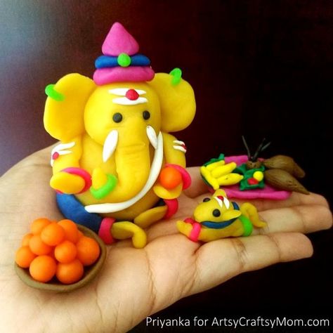 How to Make Clay Ganesha at Home - Ganesh Chaturthi Crafts and Activities to do with Kids - Make a Clay Ganesha, decorate, Ganesha's throne & umbrella, rangoli ideas, recipes, books and more Ganesh Making, Clay Art For Kids, Activities To Do With Kids, Clay Ganesha, Ganesh Chaturthi Decoration, Clay Crafts For Kids, Happy Ganesh Chaturthi Images, Baby Ganesha, Rangoli Ideas